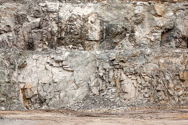 Stone pit wall Stone pit wall rock face stock pictures, royalty-free photos & images