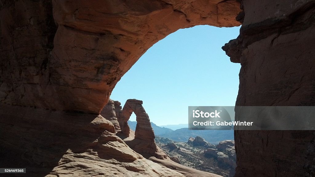 Arches within Arches Arches National Park in Moab, Utah is one of the largest densities of arches in one area in the United States.  Cave Stock Photo