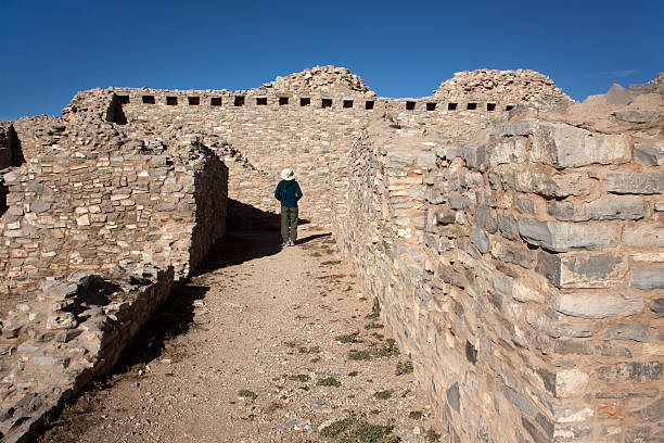istock Woman explores Gran Quivera ruins Salinas Pueblo Missions 526469881