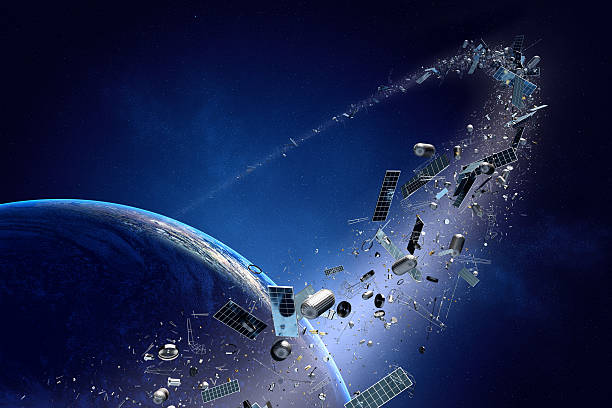 Space junk (pollution) orbiting earth Space junk orbiting around earth - Conceptual of pollution around our planet (Texture map for 3d furnished by NASA -  http://visibleearth.nasa.gov/) outer space stock pictures, royalty-free photos & images