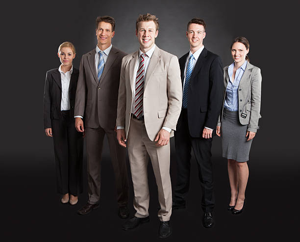 istock Confident Business Team Standing Arms Crossed 526471755