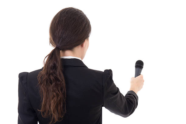 female journalist with microphone isolated on white stock photo