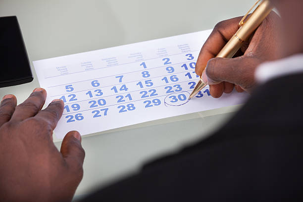 istock Businessman Marking On Calendar 526472483