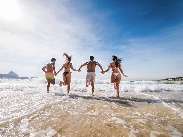 istock People having fun in the sea. 526492033