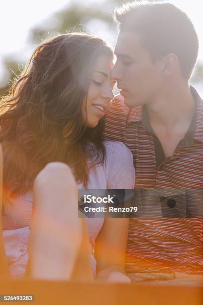 Happy Young Couple On A Picnic Stock Photo - Download Image Now - 20-29 Years, Adult, Affectionate