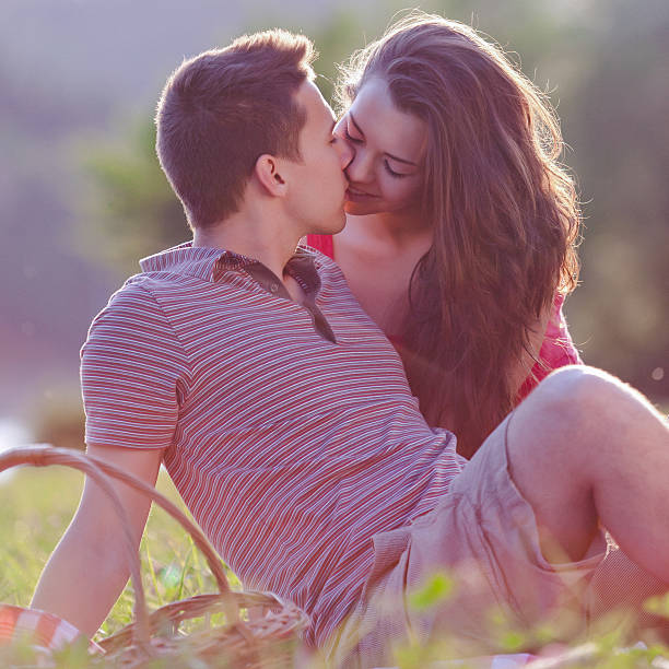 istock Happy young couple on a picnic 526493291