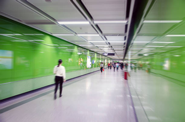 Business people activities, walk in the underground passage. stock photo