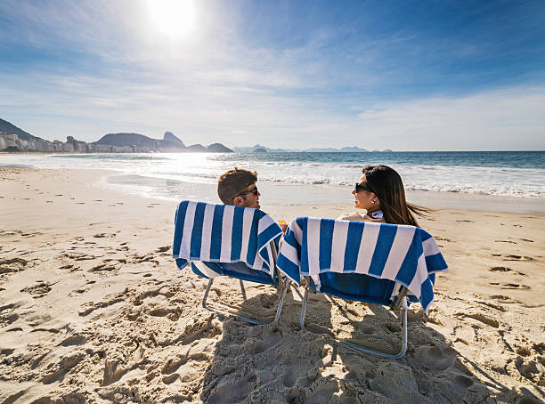 istock Enjoying in deck chairs on the beach. 526494189