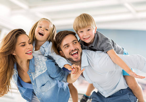 istock Cheerful family piggybacking. 526494577