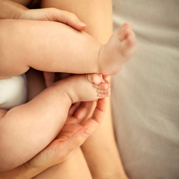 istock Mom resting with her baby 526496175