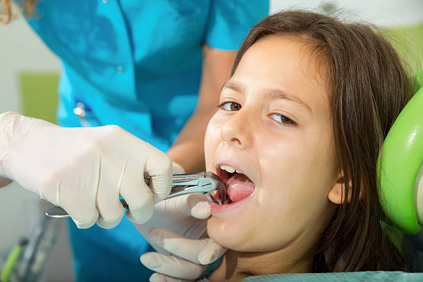 istock Little girl in dentist office 526496313