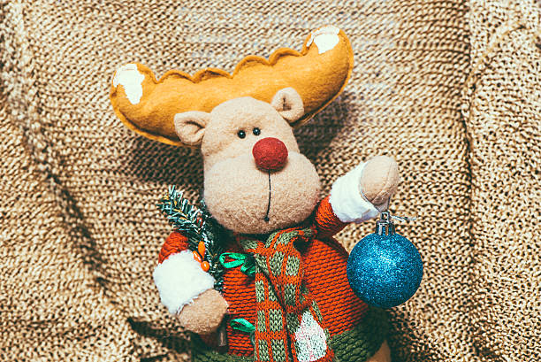 istock Christmas decoration on warm background with christmas deer 526496537