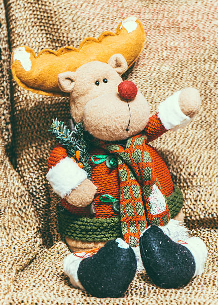 Christmas decoration on warm background with christmas deer