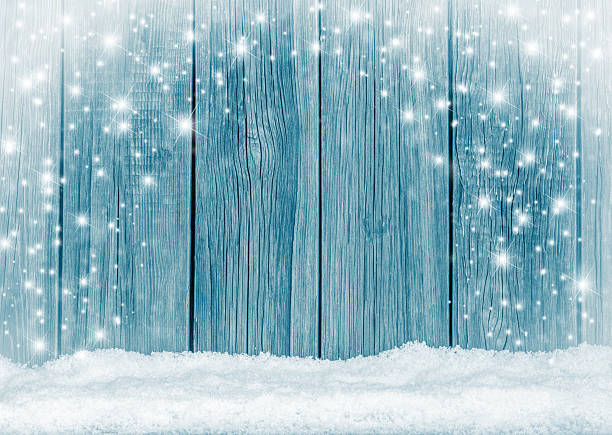 istock Old wooden  boards and white snow background 526496593