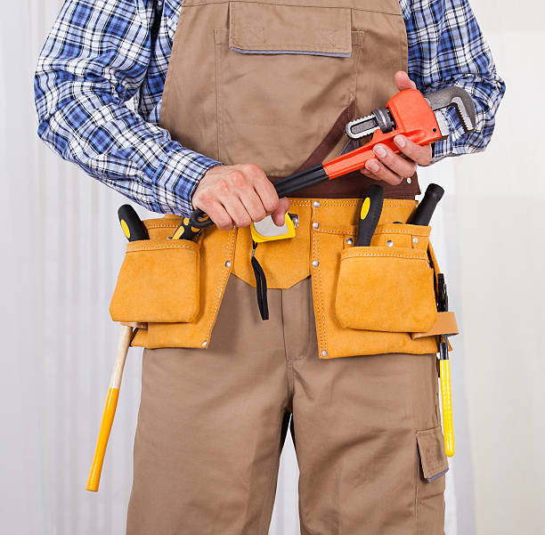 istock Repairman Holding Adjustable Wrench 526504899