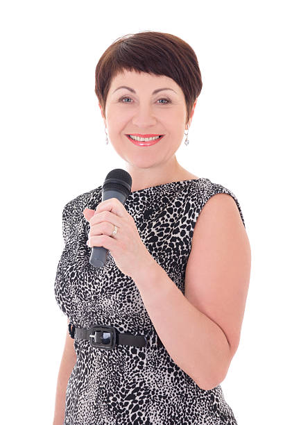 istock attractive middle aged journalist with microphone isolated 526505299
