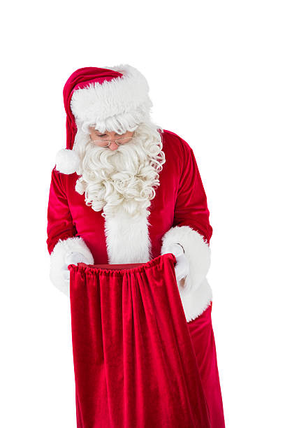 istock Santa claus looking in sack 526505545