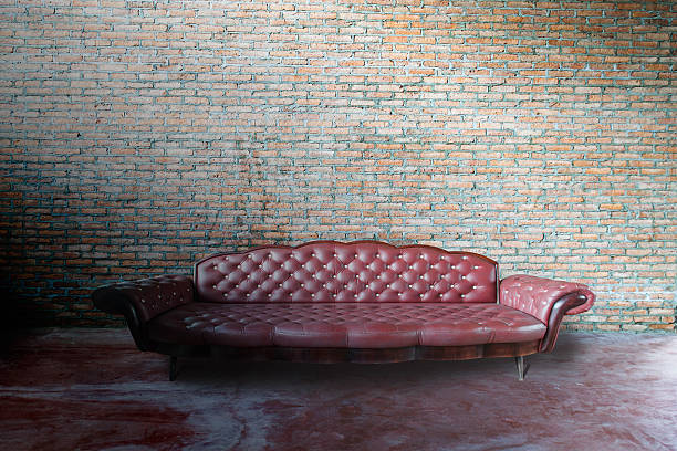 istock red  sofa  in vintage room 526508857