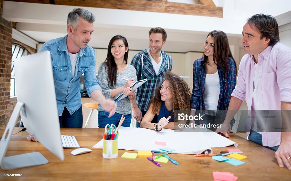 Creative entrepreneurs Group of creative entrepreneurs at the office Adult Stock Photo