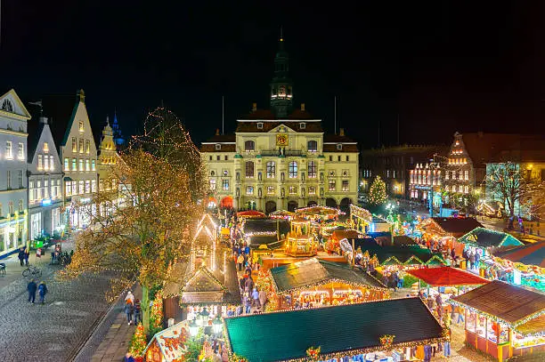 View on Luneburg´s christmas market and town hall at night.