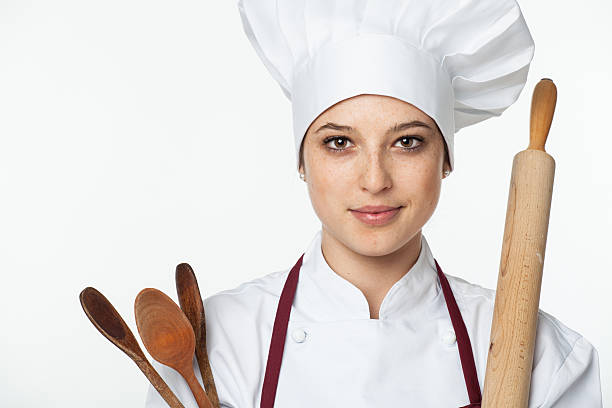 Chef woman with cooking tools Chef woman with cooking tools on white background chefs whites stock pictures, royalty-free photos & images