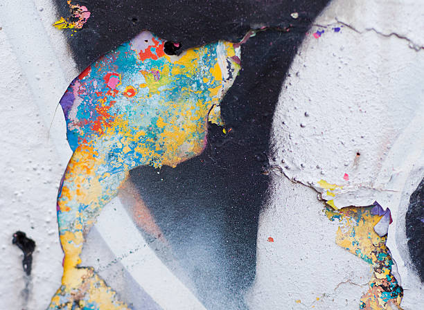 istock Wall with several layers of paints and holes on it 526532761