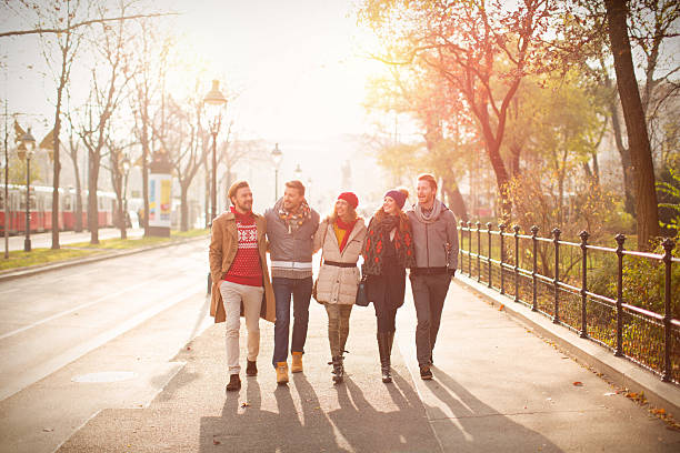 istock Friends walking outdoors in autumn city. 526532813