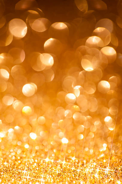 istock Golden Defocused Glitter Background - Christmas Bokeh Gold 526532857