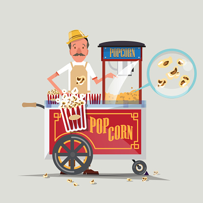 popcorn cart with seller.