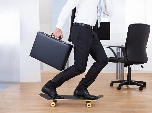 istock Businessman On Skateboard In Office 526534455