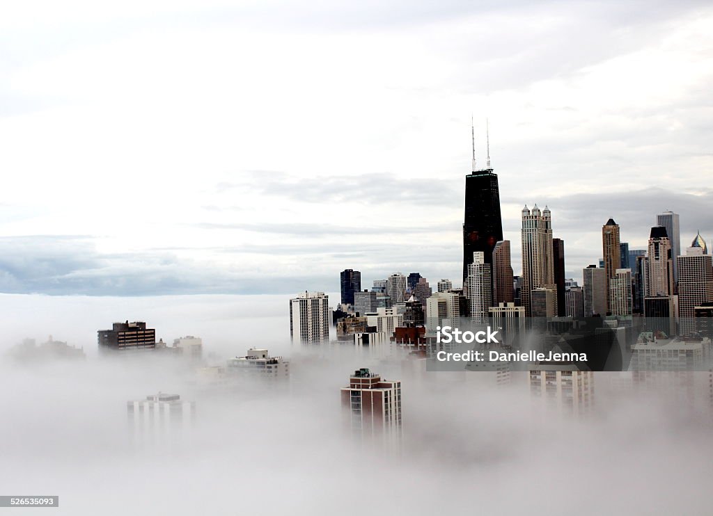 Chicago city buildings in the clouds Taken in March 2012 during a massive fog that covered the city landscape.  Chicago - Illinois Stock Photo