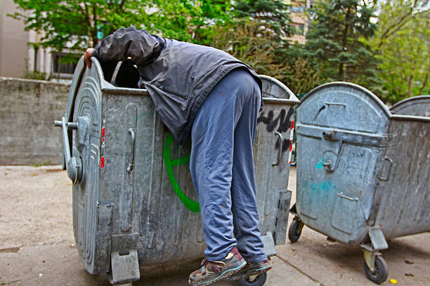 310+ Homeless Looking For Food In The Garbage Bin Stock Photos, Pictures & Royalty-Free Images - iStock