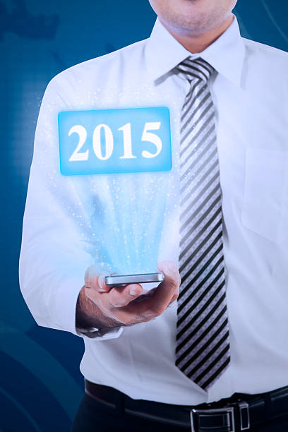 istock Businessman holding high tech smartphone 526537771