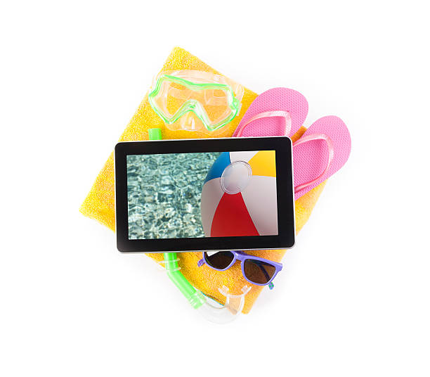 tablet & wakacje - digital tablet beach digital display pc zdjęcia i obrazy z banku zdjęć