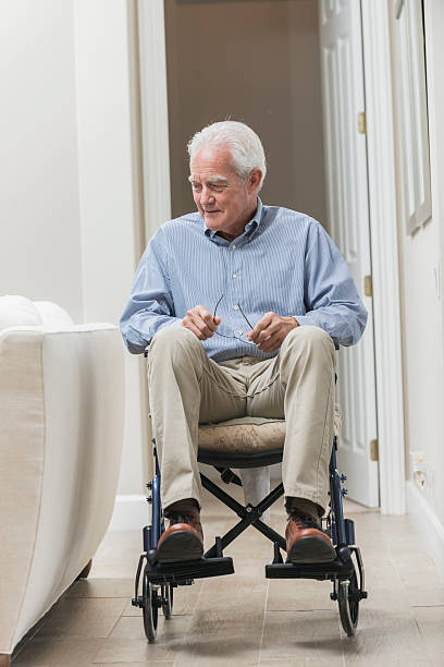 istock Senior man at home in a wheelchair 526539492