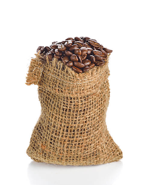 istock coffee beans in bag isolated on white background 526541208