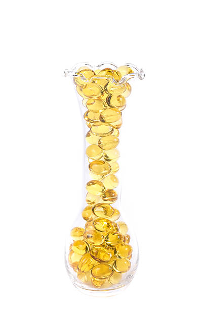 istock Fish oil, Omega 3-6-9 yellow soft gels capsules 526542418
