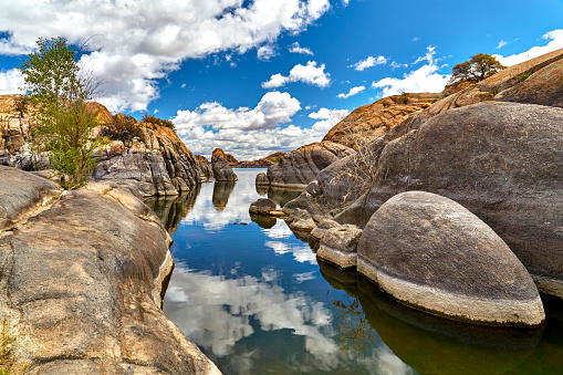 Willow Lake Prescott Arizona in boulders showing water line on rocks