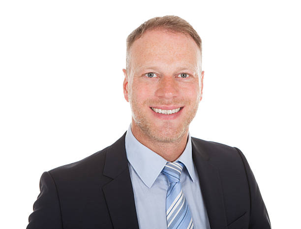istock Confident Young Businessman Smiling 526544405