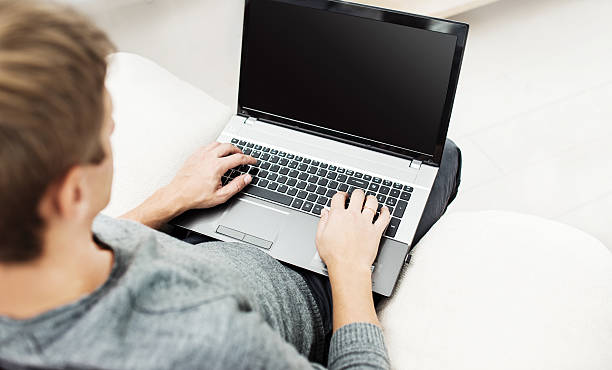 istock Man working on the laptop at home 526545943