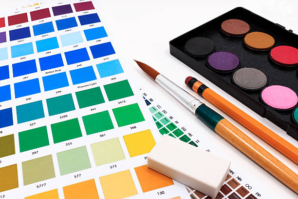 istock Color chart guide, brushes and paint tube on white background, 526545990