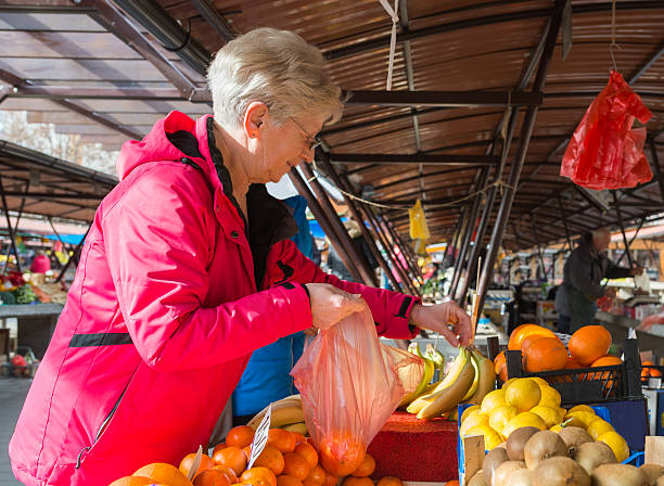 istock senior ladies at market 526546554