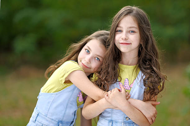 istock Portrait of two little girls twins 526546708