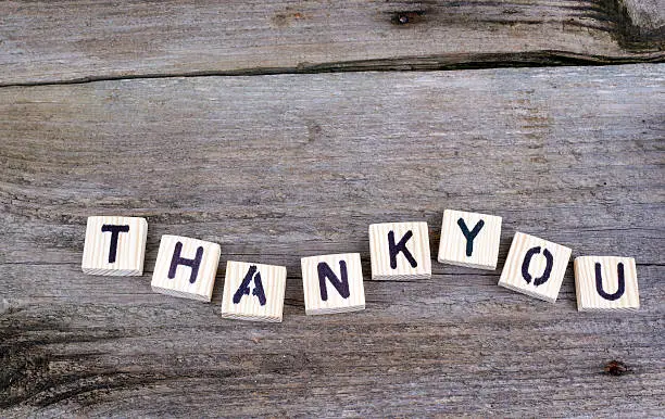 Text: Thankyou from wooden letters on wooden background