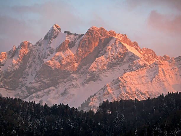 Snow covered Mount Pilatus in the evening sunlight.