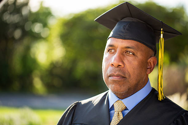 istock Mature African American man graduating 526548404