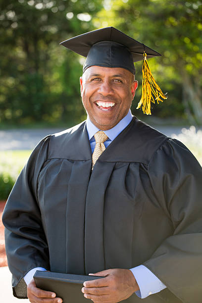 istock Mature African American man graduating 526548624