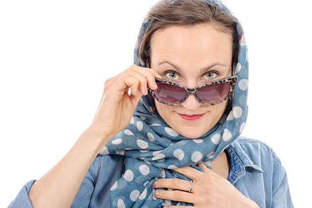 istock Beautiful woman with sunglasses isolated on white 526548644