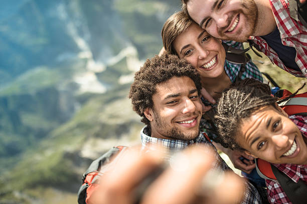 istock group of friends doing a selfie on the mountain 526548940