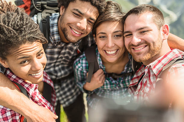 istock group of friends doing a selfie on the mountain 526549000